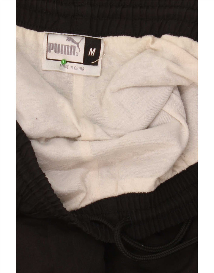 Puma Herren-Trainingshose mit Grafik, mittelschwarzes Polyester