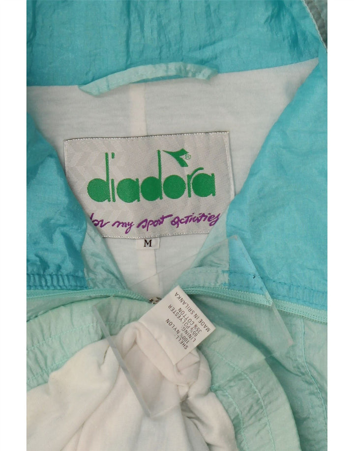 Diadora Übergroße Trainingsjacke für Damen, UK 14, Mittelblau mit Blumenmuster