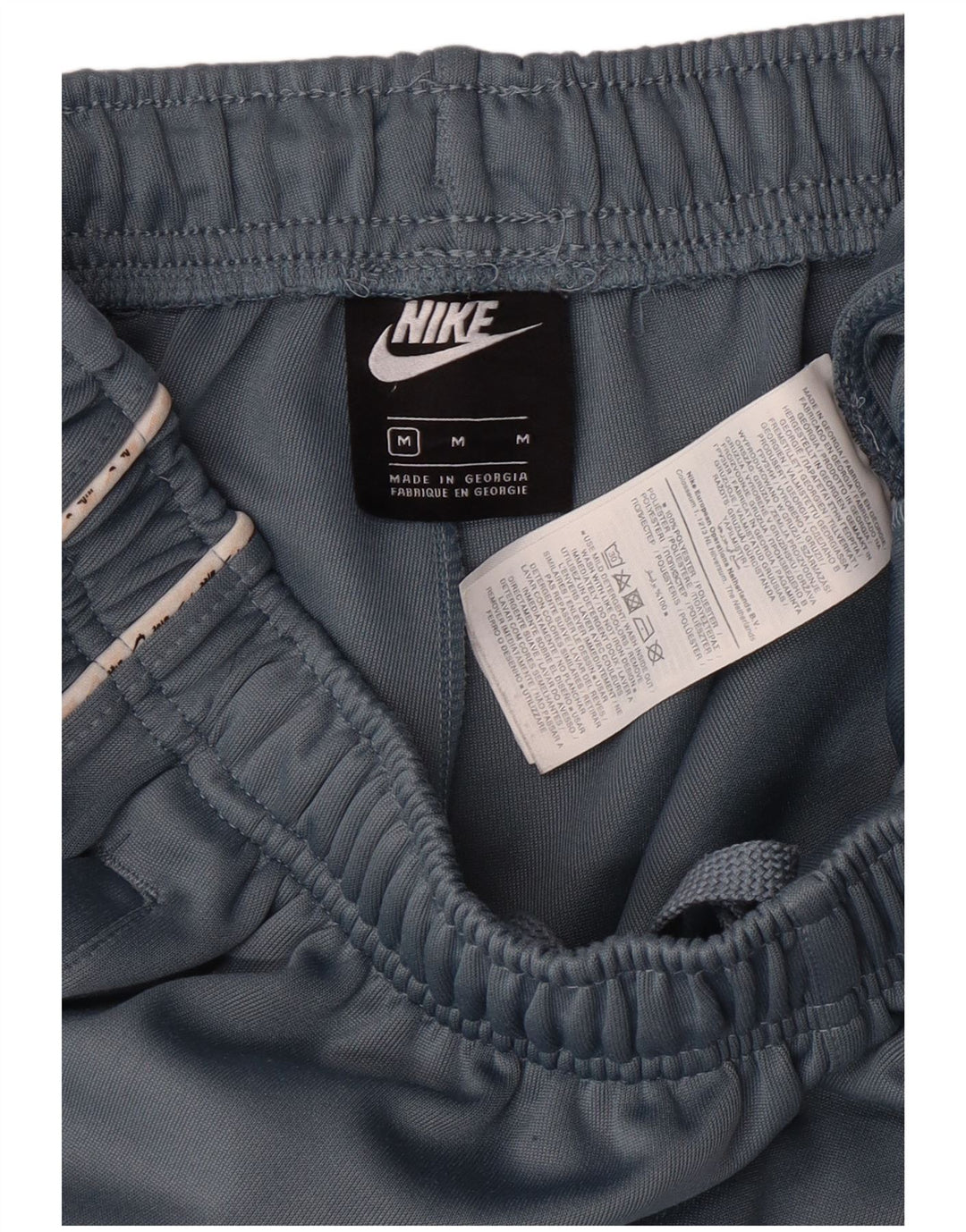 NIKE Mens Tracksuit Trousers Joggers Medium  Blue Polyester