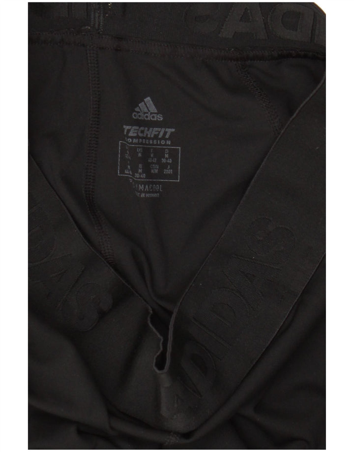 Adidas Damen Graphic Leggings UK 12/14 Medium Schwarz