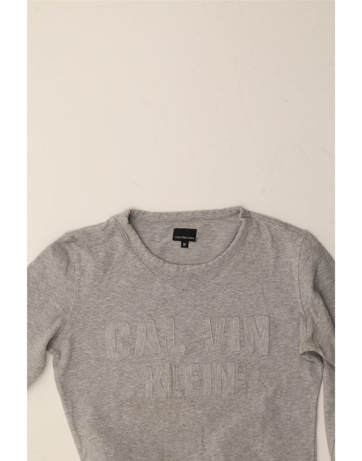 CALVIN KLEIN Womens Crop Graphic Sweatshirt Jumper UK 12 Medium Grey Vintage Calvin Klein and Second-Hand Calvin Klein from Messina Hembry 
