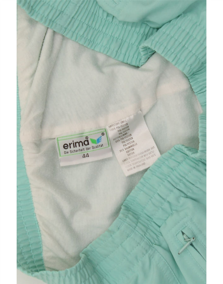 ERIMA Womens Tracksuit Trousers IT 44 Medium Blue Polyester Vintage Erima and Second-Hand Erima from Messina Hembry 