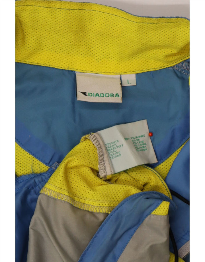 DIADORA Herren-Trainingsanzug mit grafischem Oberteil, groß, blaues Colourblock-Polyamid
