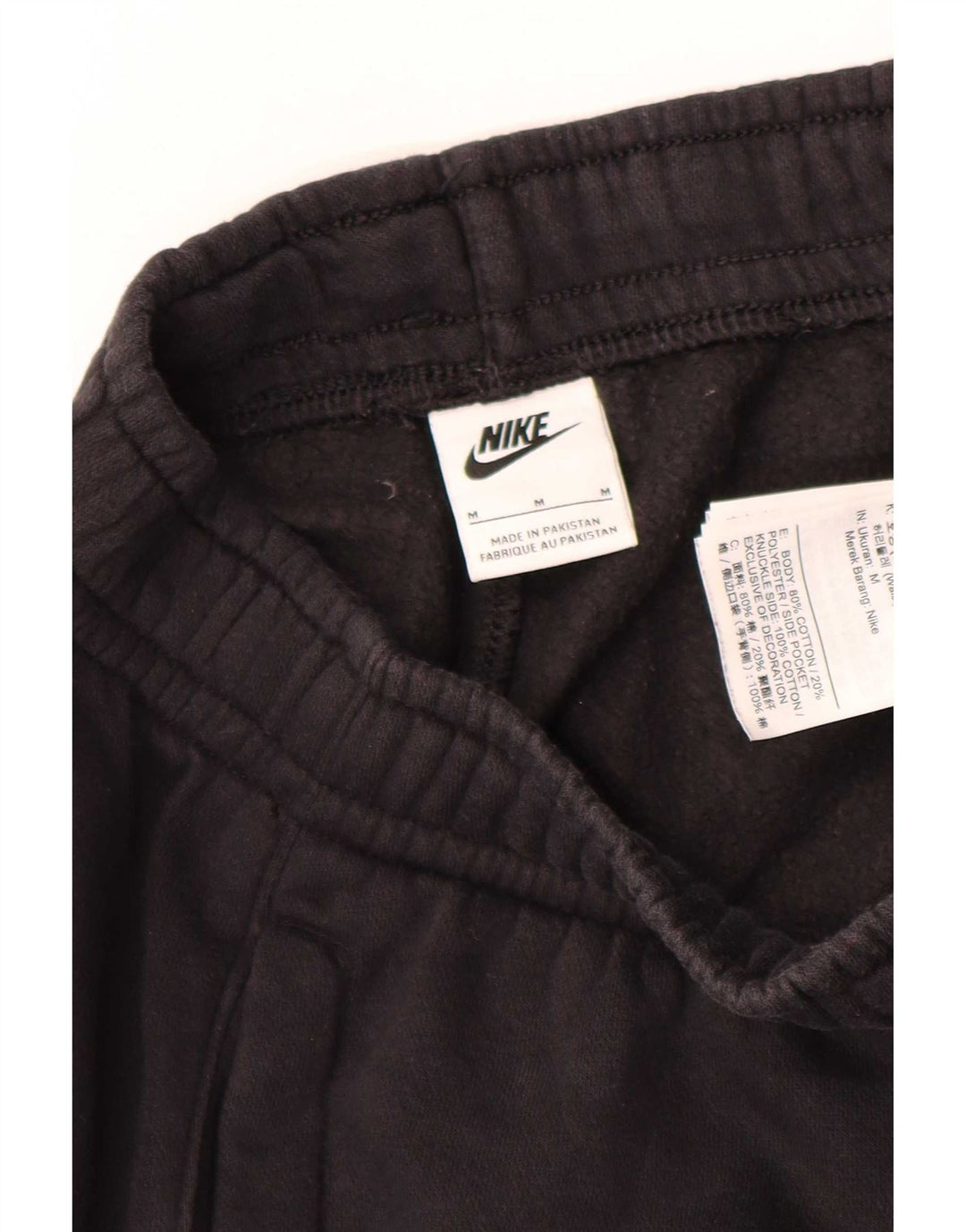 Nike Herren-Trainingsanzug mit Cargo-Grafik, Jogginghose, mittelschwarz, Baumwolle