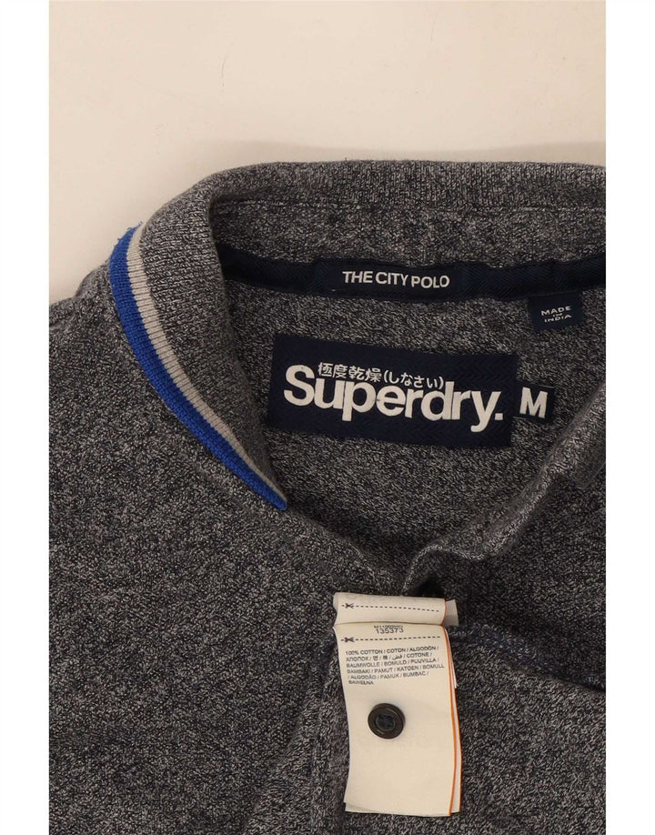 Superdry Herren-Poloshirt aus mittelblauer Baumwolle in Marineblau