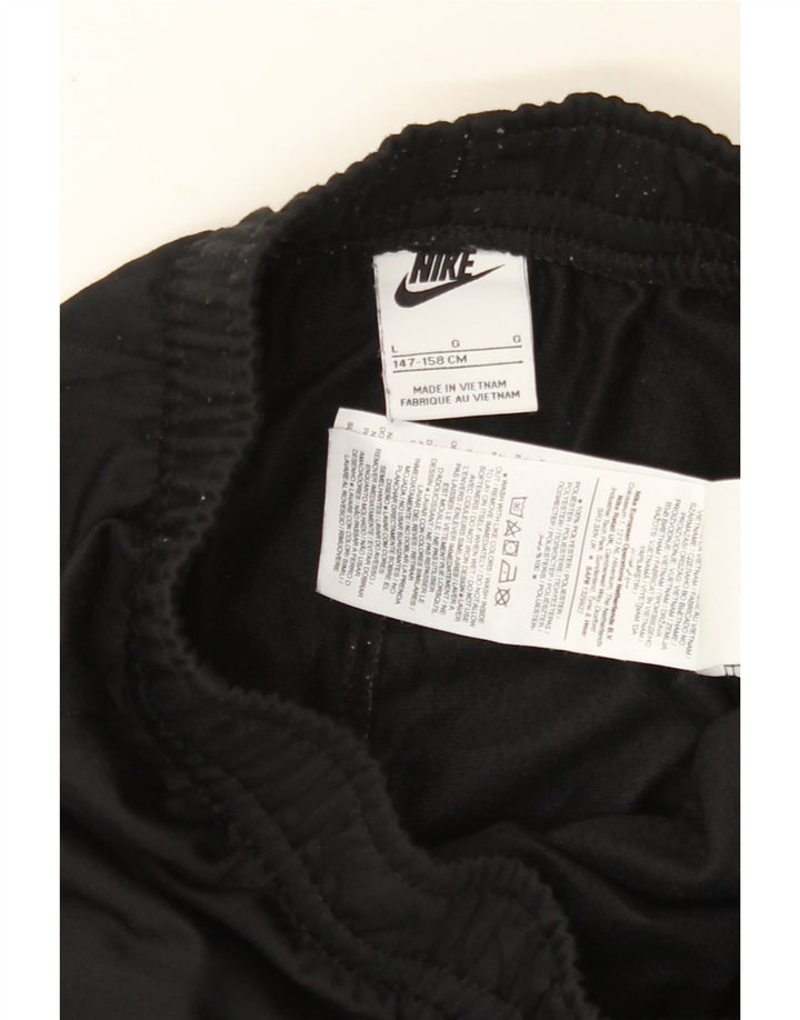 NIKE Boys Tracksuit Trousers Joggers 12-13 Years Large Black Polyester Vintage Nike and Second-Hand Nike from Messina Hembry 