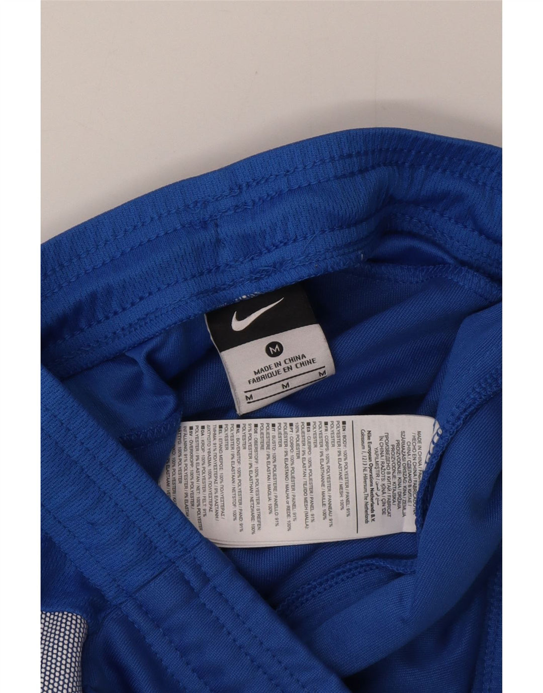 Nike Herren-Trainingshose aus mittelblauem Colourblock-Polyester