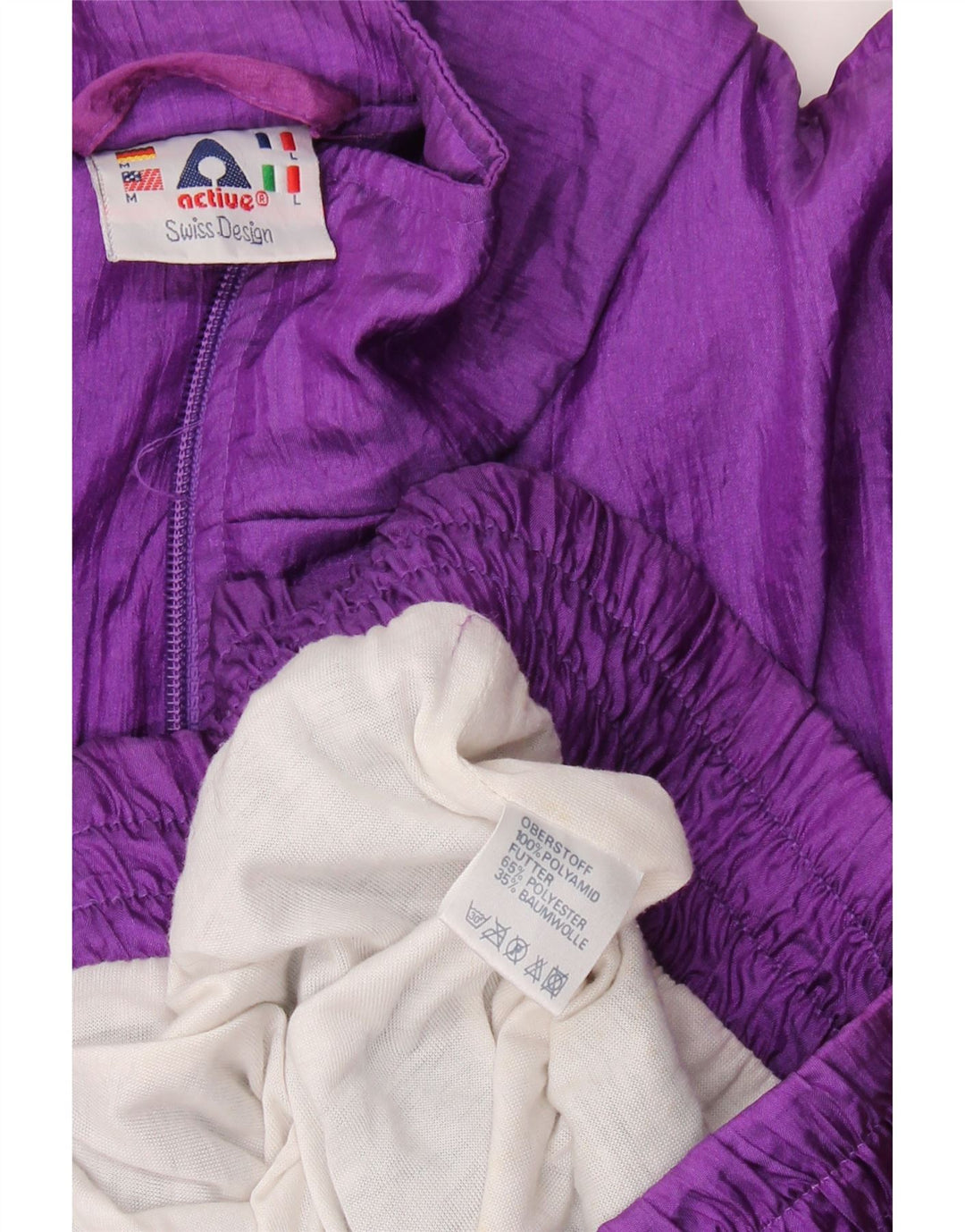 Active Herren-Trainingsanzug mit lockerer Passform, mittelviolettes Colourblock-Polyamid