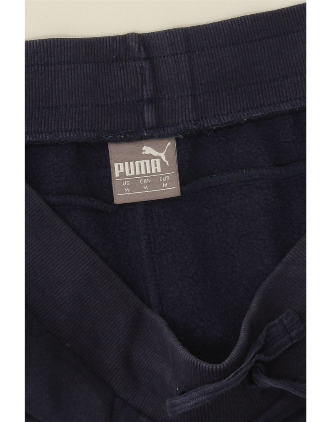 Puma Herren-Trainingshose mit Grafik, mittelblau, Baumwolle