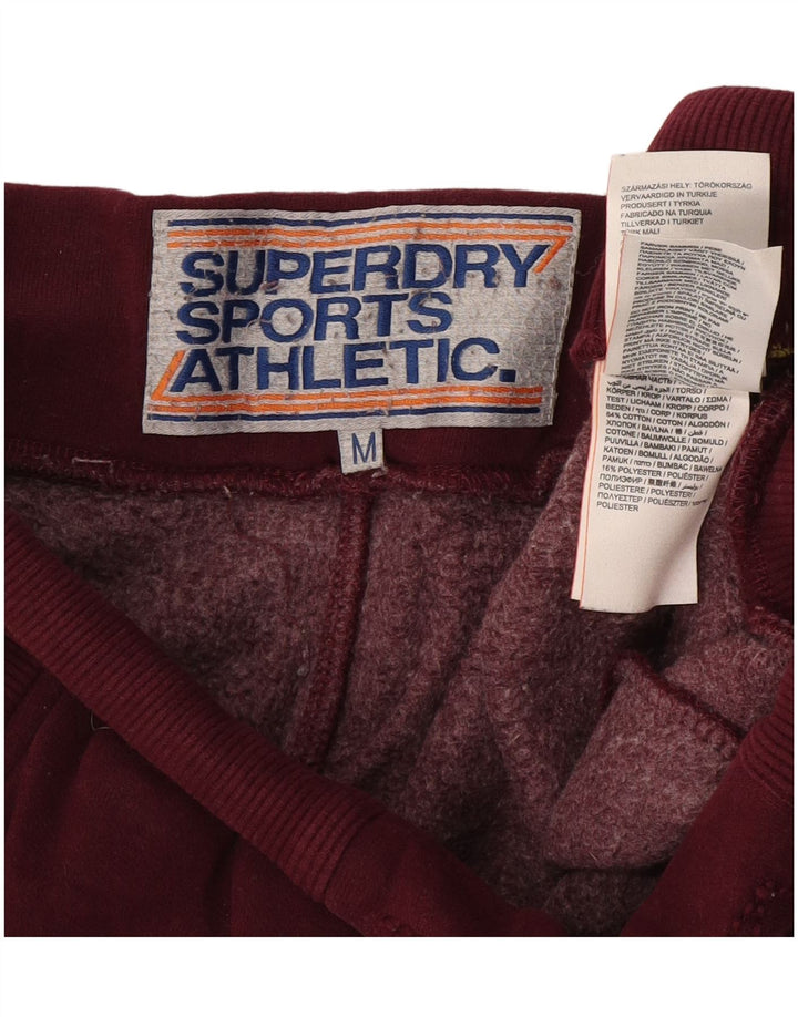 Superdry Herren-Trainingshose mit Grafik, mittleres Burgunderrot, Farbblock