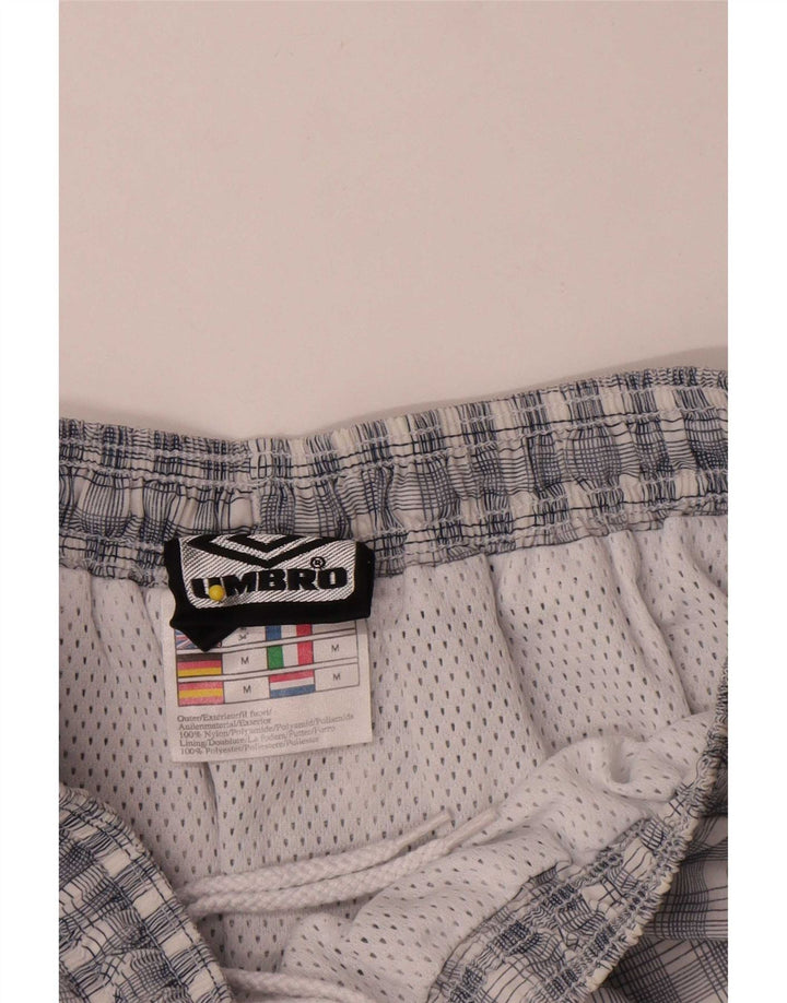 Umbro Herren-Sportshorts aus Nylon in mittlerem Marineblau mit Karomuster