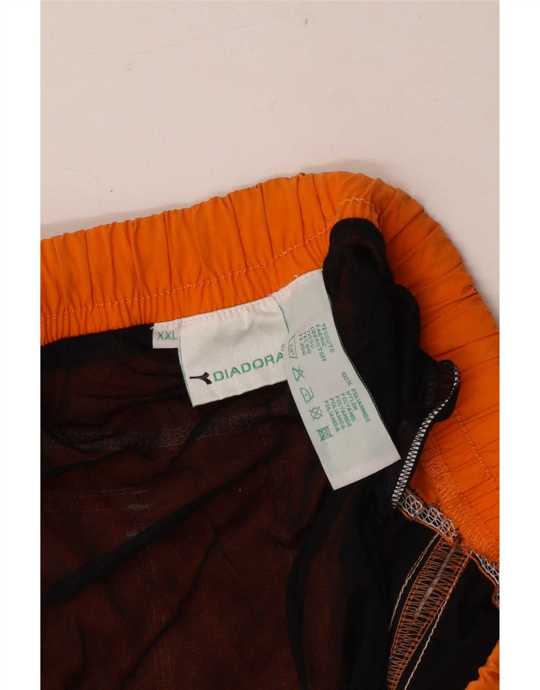 Diadora Herren-Badeshorts, normal, 2XL, orangefarbenes Colourblock-Polyamid