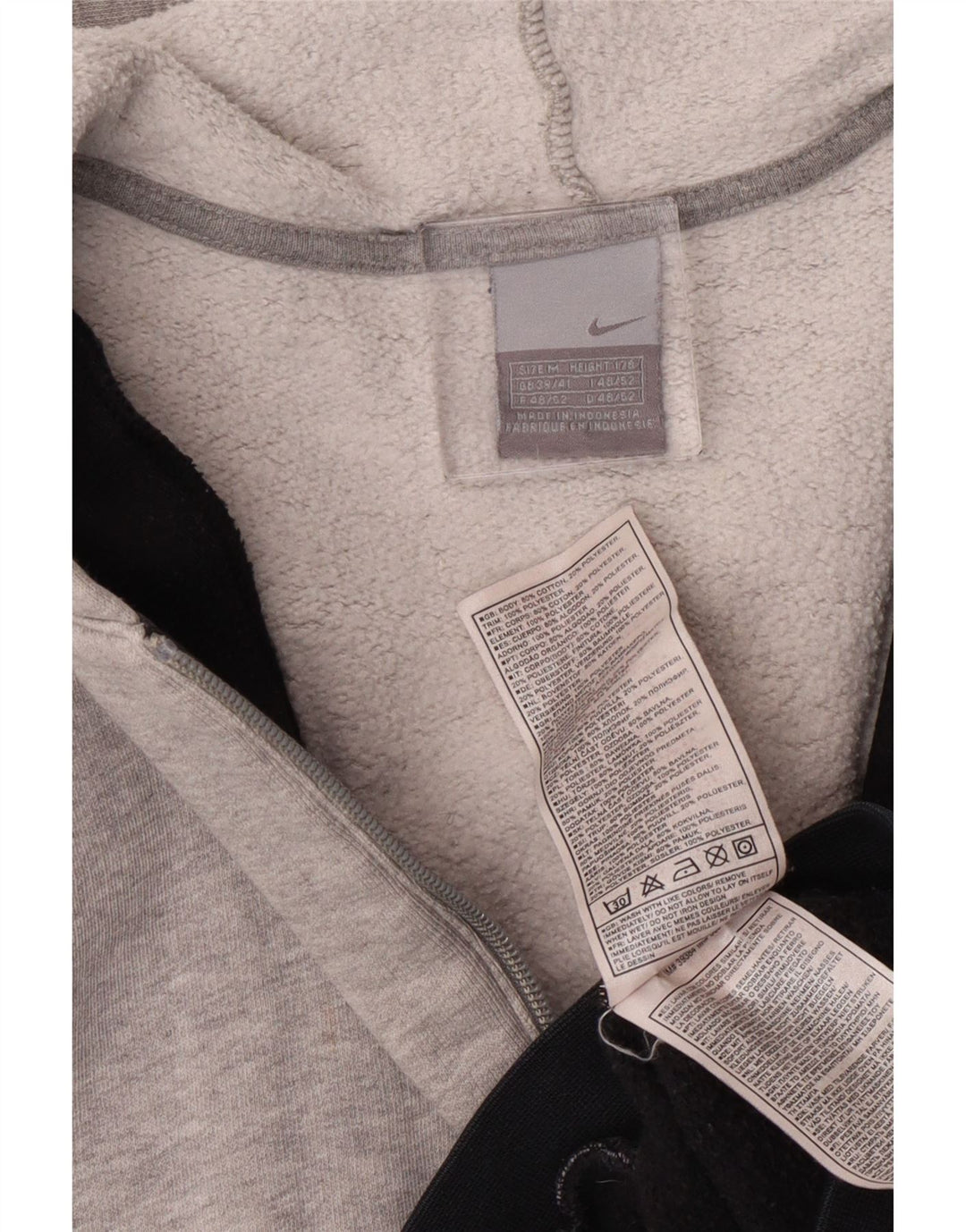 Nike Herren-Kapuzenpullover mit grafischem Reißverschluss, UK 39/41, Mittelschwarz, Farbblock