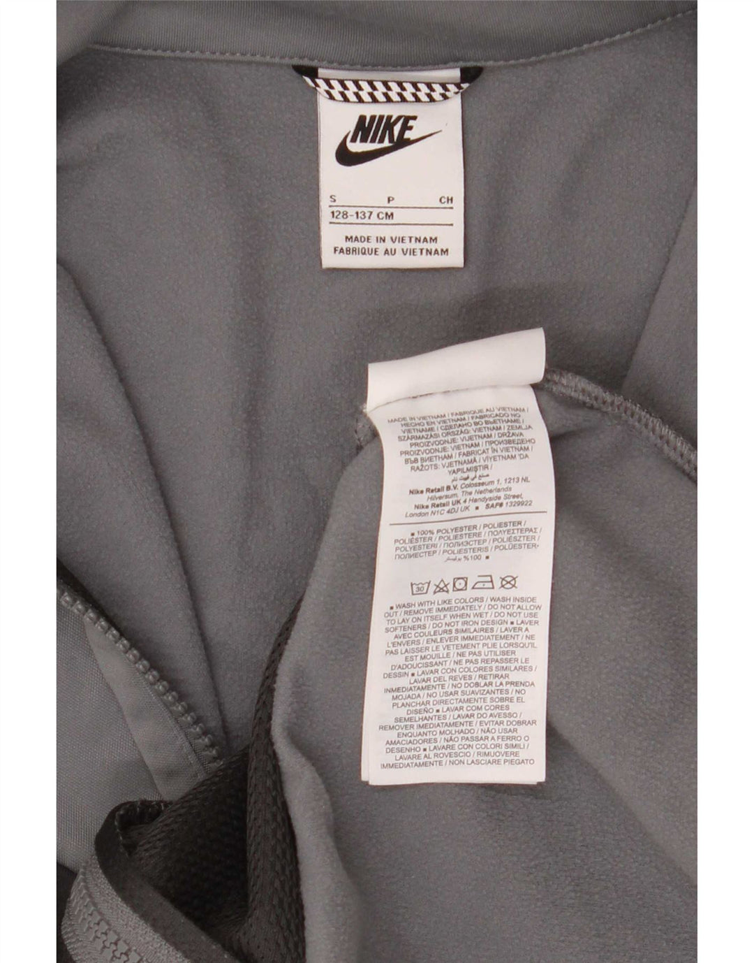 Nike Jungen-Trainingsanzugoberteil mit Grafik, 8–9 Jahre, Größe S, Grau, Farbblock