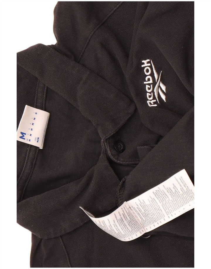 Reebok Herren Poloshirt Medium Schwarz Baumwolle