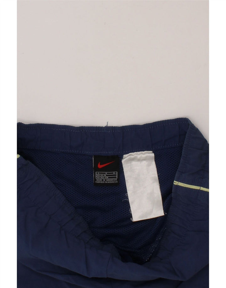 NIKE Boys Sport Shorts 12-13 Years Large  Navy Blue Vintage Nike and Second-Hand Nike from Messina Hembry 