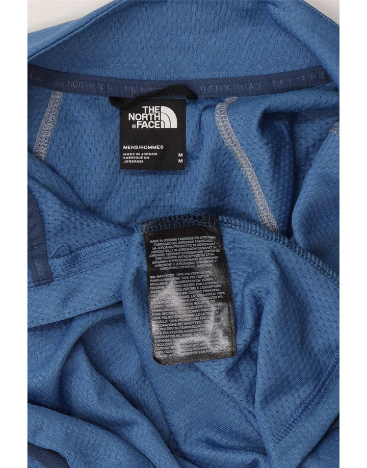 The North Face Herren-Pullover-Trainingsanzugoberteil mit Reißverschluss und Rundhalsausschnitt, Mittelblau, Farbblock