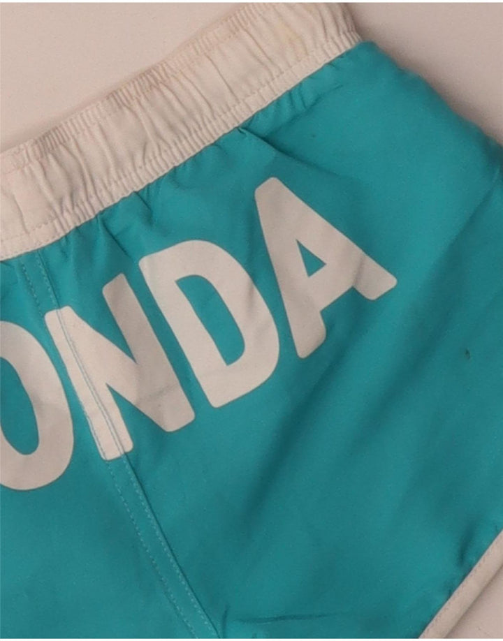 BENETTON Jungen-Badeshorts mit Grafik, 8–9 Jahre, blaues Farbblockdesign