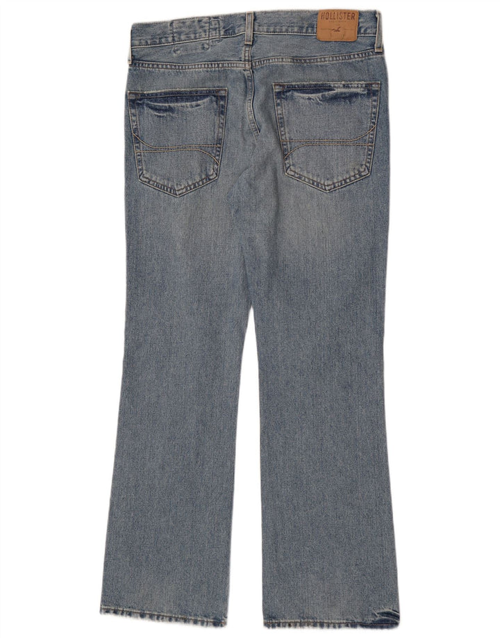 Hollister Herren Distressed Bootcut Jeans W34 L32 Blaue Baumwolle