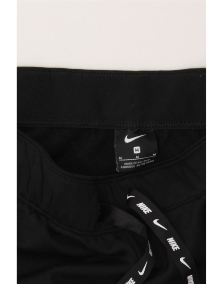 NIKE Womens Crop Tracksuit Trousers UK 12 Medium  Black Polyester Vintage Nike and Second-Hand Nike from Messina Hembry 