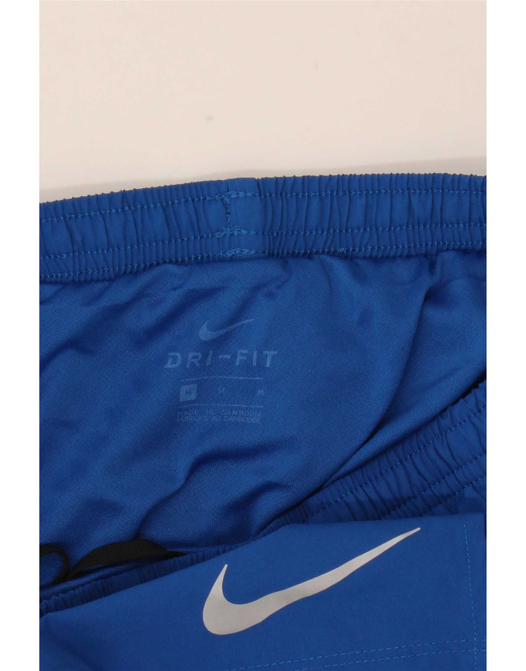 Nike Herren Dri Fit Sportshorts in mittelblauem Farbblockdesign