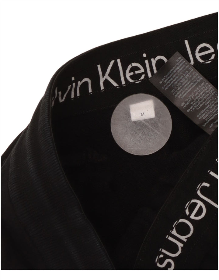 CALVIN KLEIN Herren Cargo-Trainingsanzughose mit grafischer Grafik, Mittelschwarz