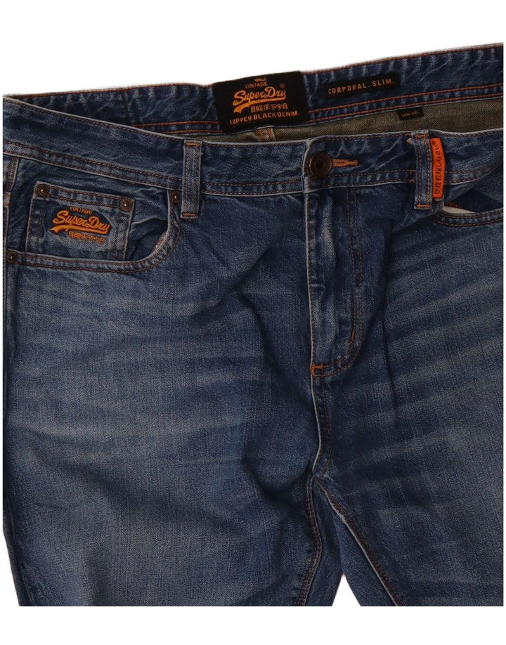 SUPERDRY Herren Corporal Slim Jeans W36 L34 Blaue Baumwolle