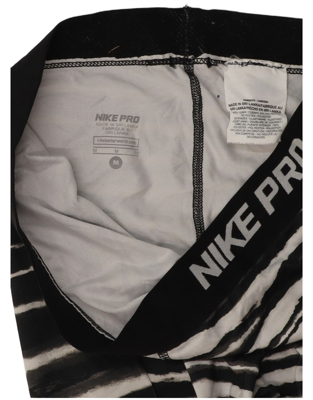 Nike Damen Capri-Trainingshose mit Grafik, UK 12, mittelschwarz gestreift