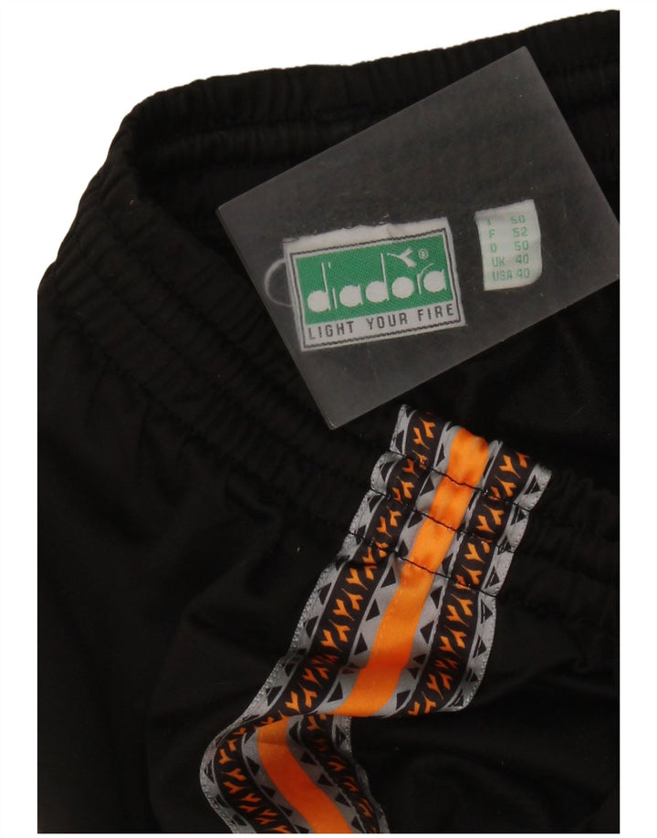 DIADORA Herren-Trainingshose, UK 40, Mittelschwarz, Farbblock