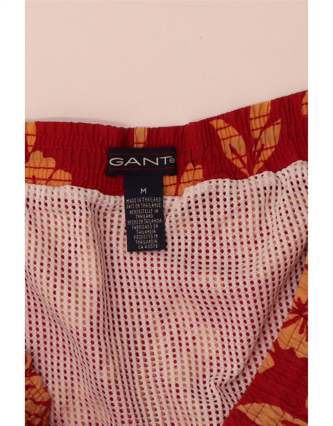 Gant Herren-Badeshorts aus mittelrotem Nylon mit Blumenmuster