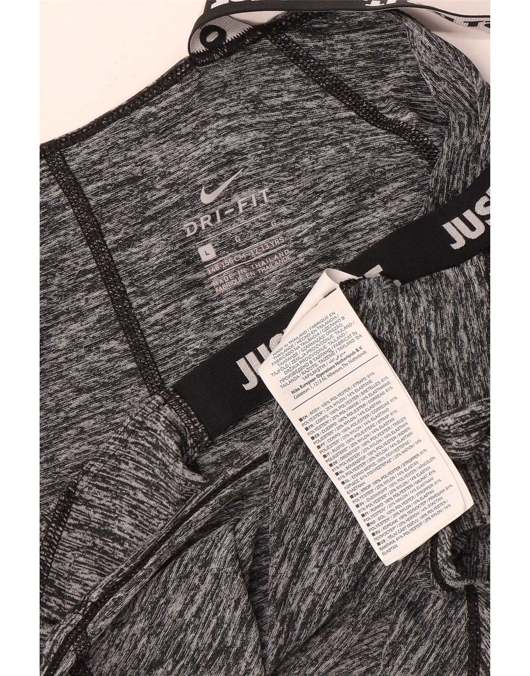 Nike Mädchen-Top mit Grafik, 12–13 Jahre, groß, grau geflecktes Polyester
