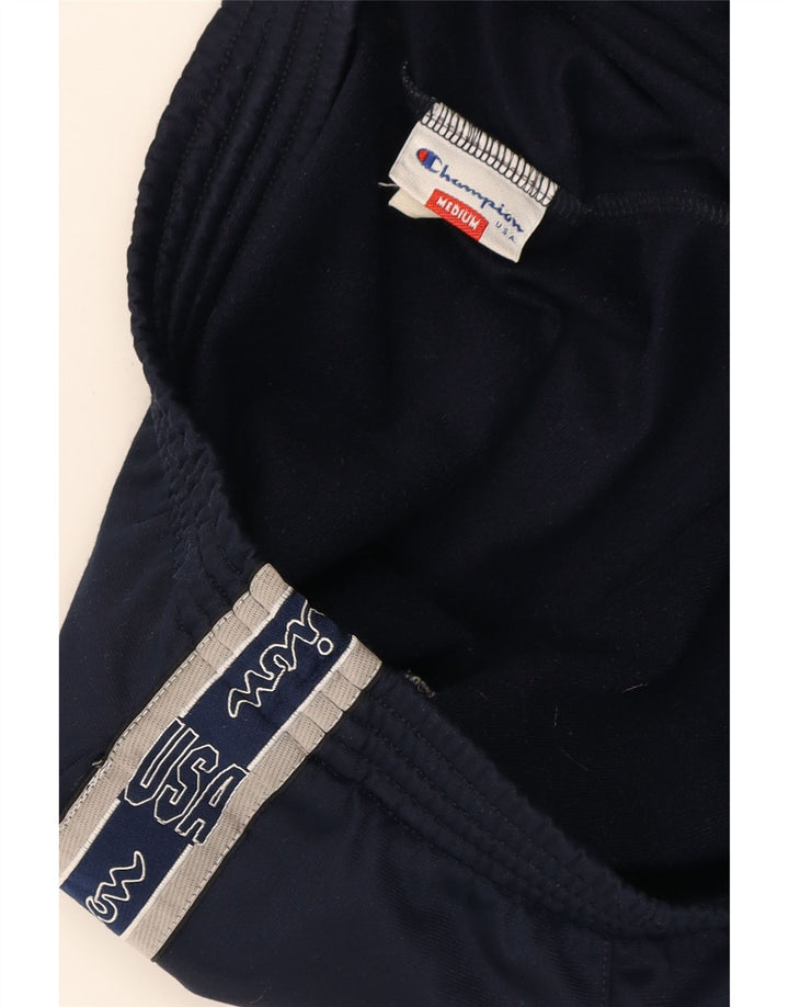 CHAMPION Mens Graphic Tracksuit Trousers Medium  Navy Blue Polyester Vintage Champion and Second-Hand Champion from Messina Hembry 