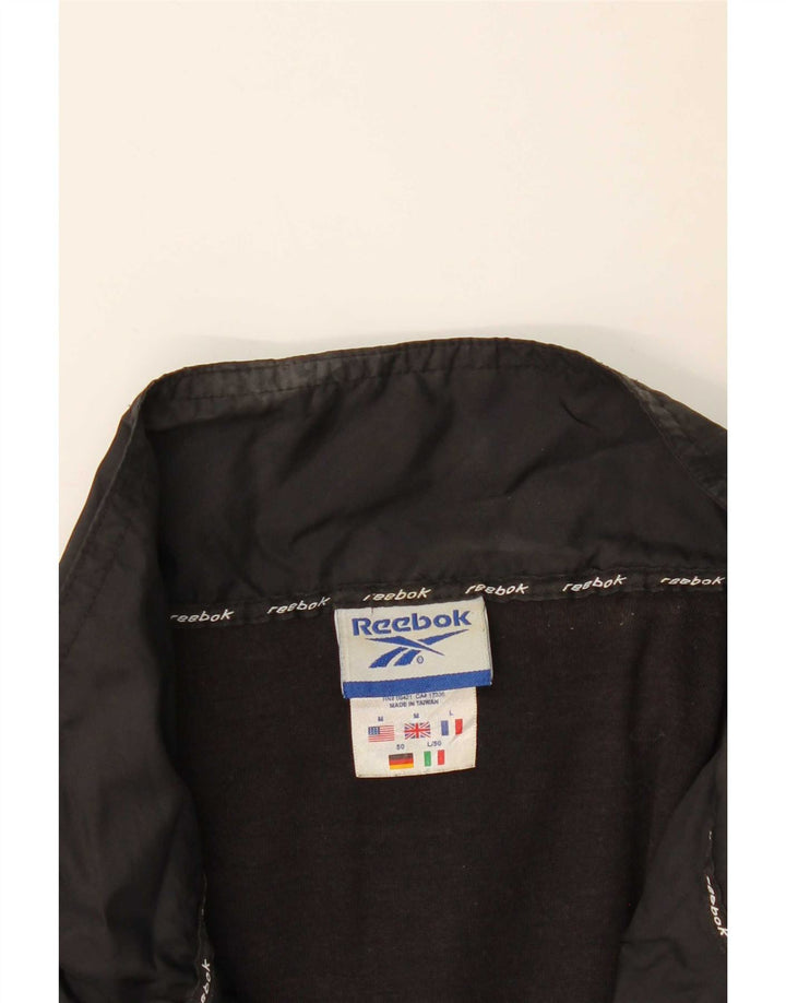 Reebok Herren-Trainingsanzugoberteil mit lockerer Passform, Mittelschwarz, Farbblock