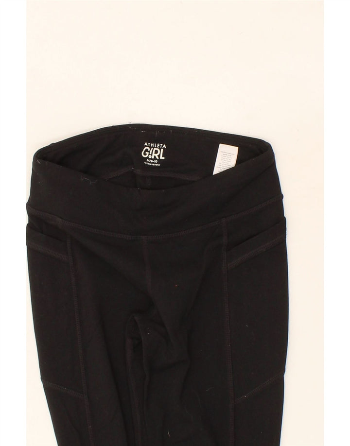 ATHLETA Girls Flare Tracksuit Trousers 8-9 Years Medium Black Polyester Vintage Athleta and Second-Hand Athleta from Messina Hembry 