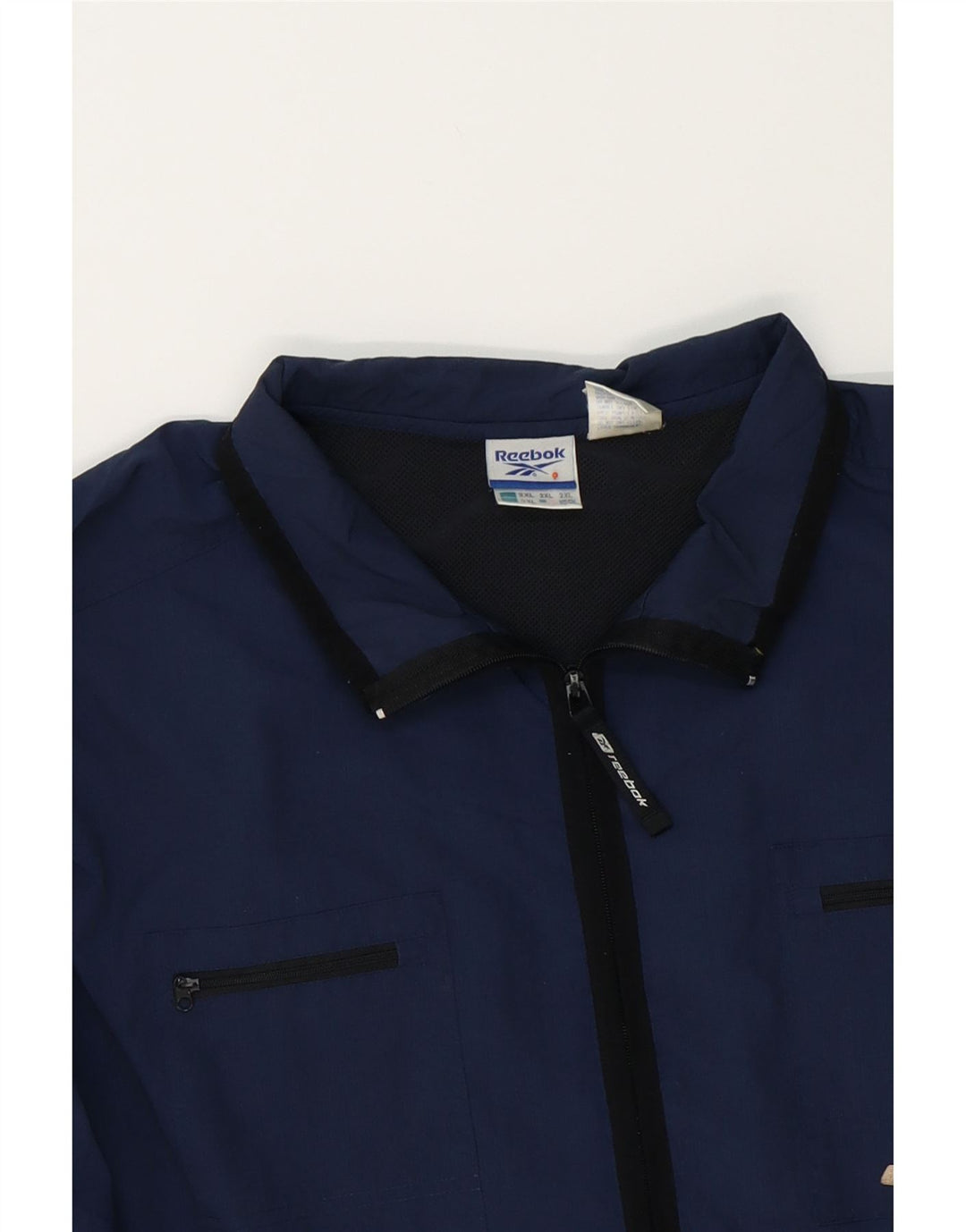 REEBOK Mens Tracksuit Top Jacket 2XL Navy Blue Polyamide Vintage Reebok and Second-Hand Reebok from Messina Hembry 