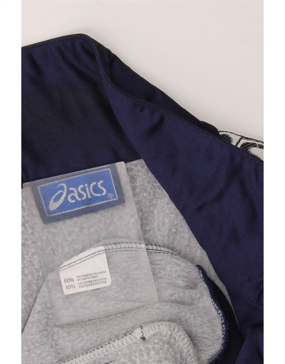 Asics Herren-Trainingsanzug mit grafischem Oberteil, mittleres Marineblau, Farbblock-Sport