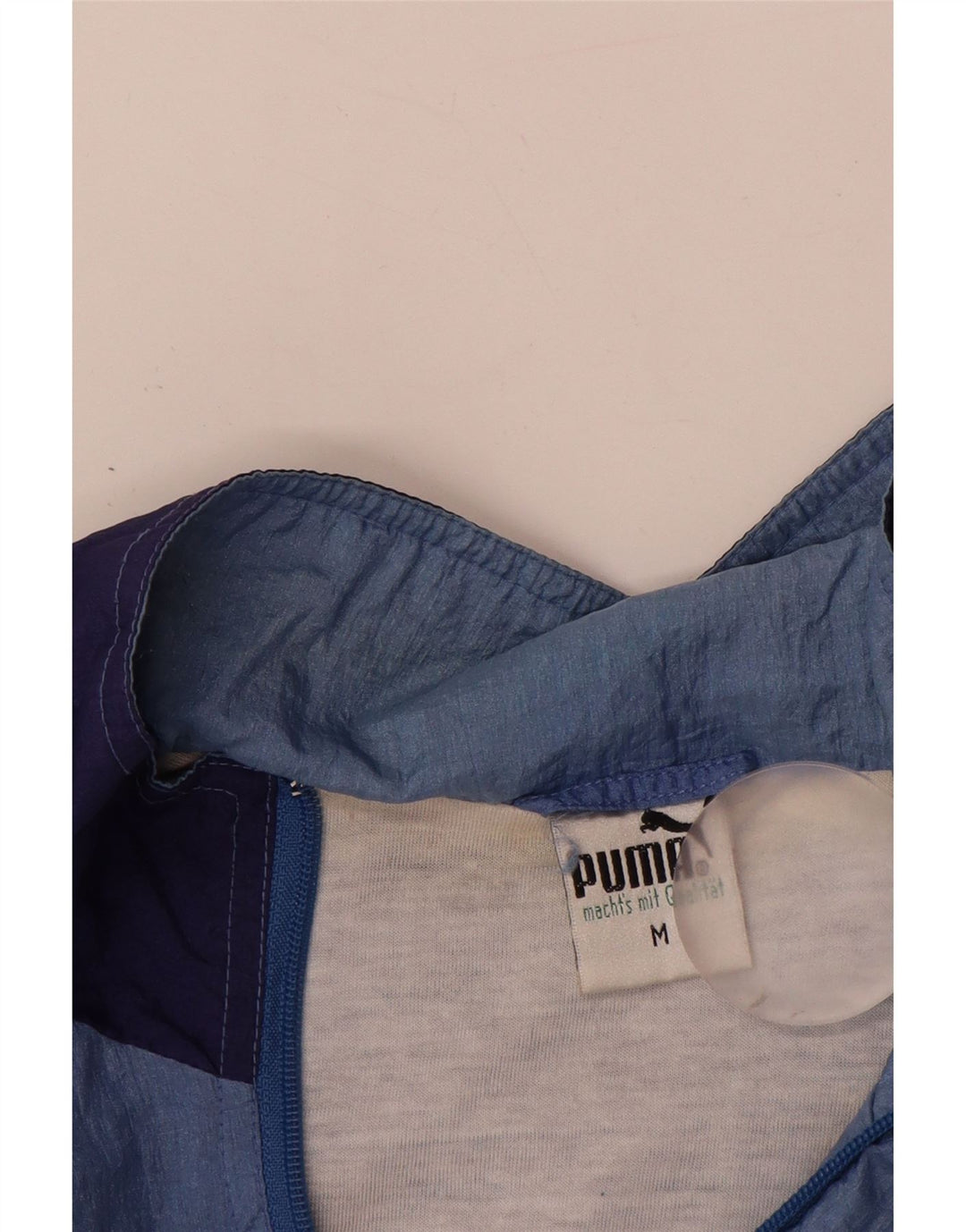 PUMA Herren-Trainingsanzug-Oberjacke, mittelblaues Colourblock-Polyamid