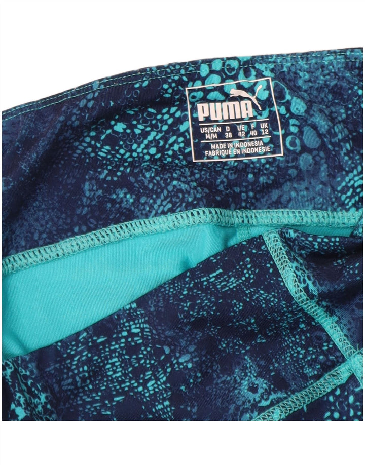 PUMA Damen Capri-Leggings mit abstraktem Muster, UK 12, Mittelblau, Polyester