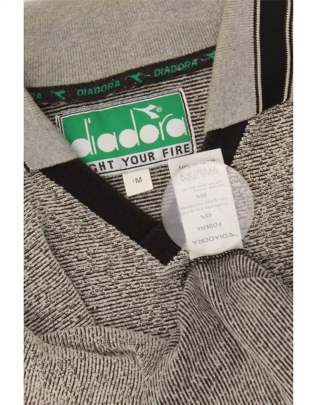 Diadora Herren-Poloshirt aus mittelgrau gestreiftem Polyester