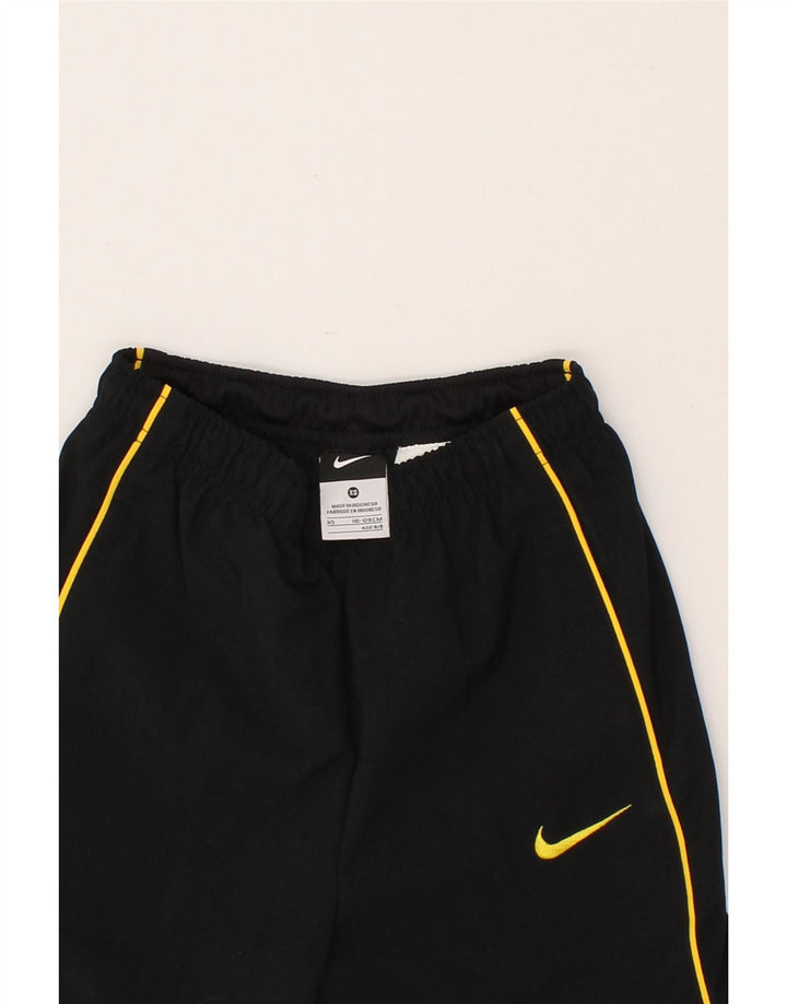 NIKE Boys Graphic Tracksuit Trousers 6-7 Years XS Black Polyester Vintage Nike and Second-Hand Nike from Messina Hembry 