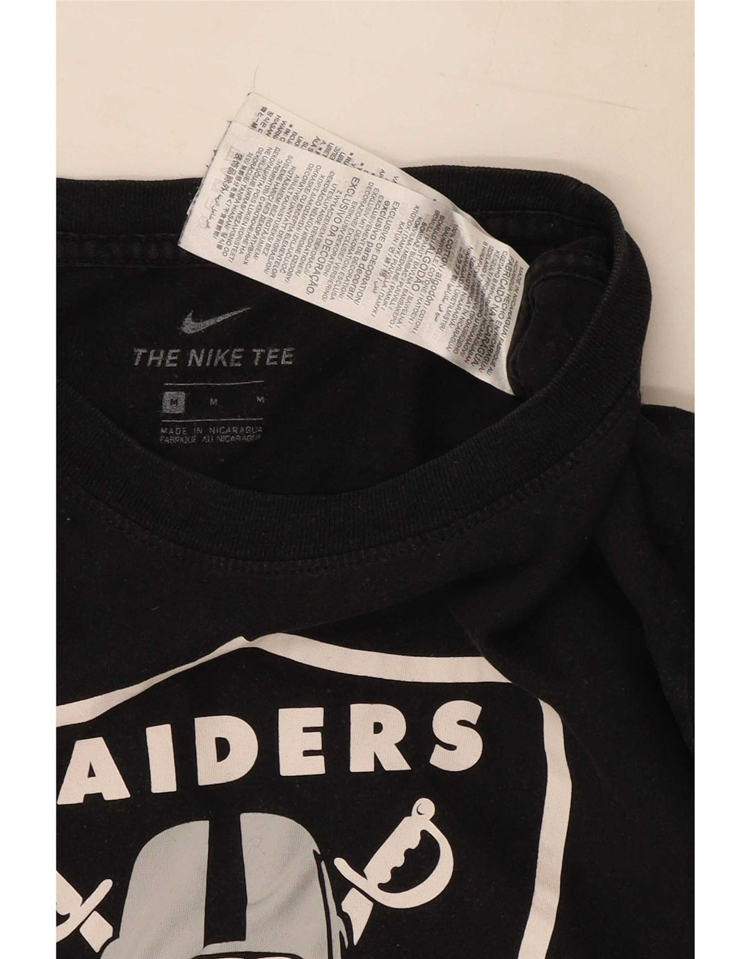 Nike Herren Raiders Grafik-T-Shirt aus mittelschwarzer Baumwolle