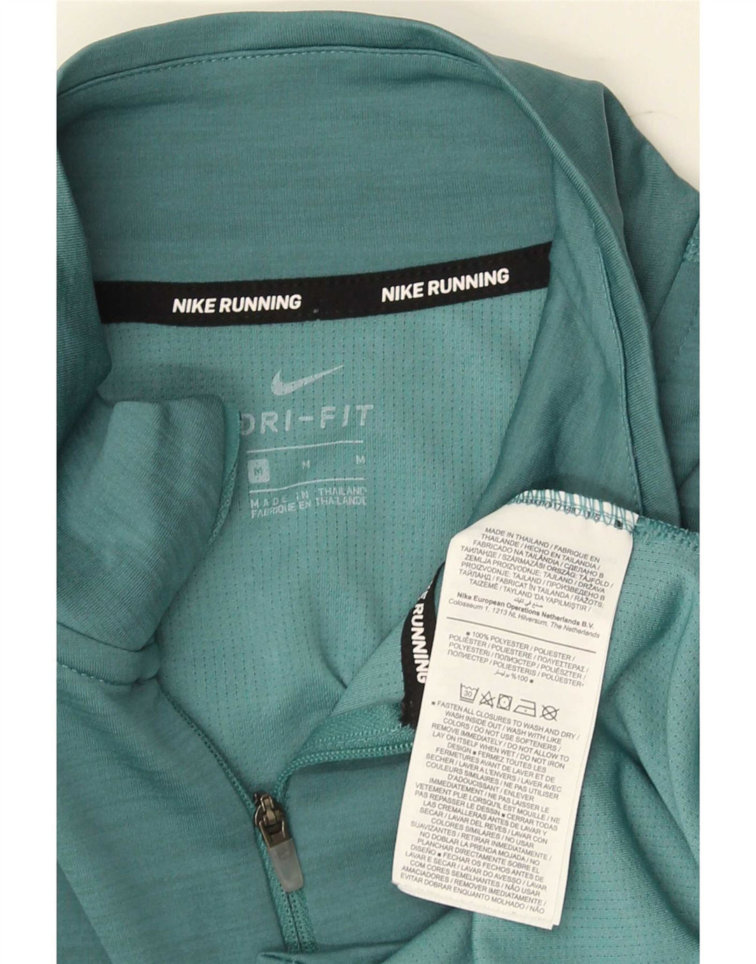Nike Herren Dri Fit Zip Neck Graphic Top Langarm mittelgrünes Polyester