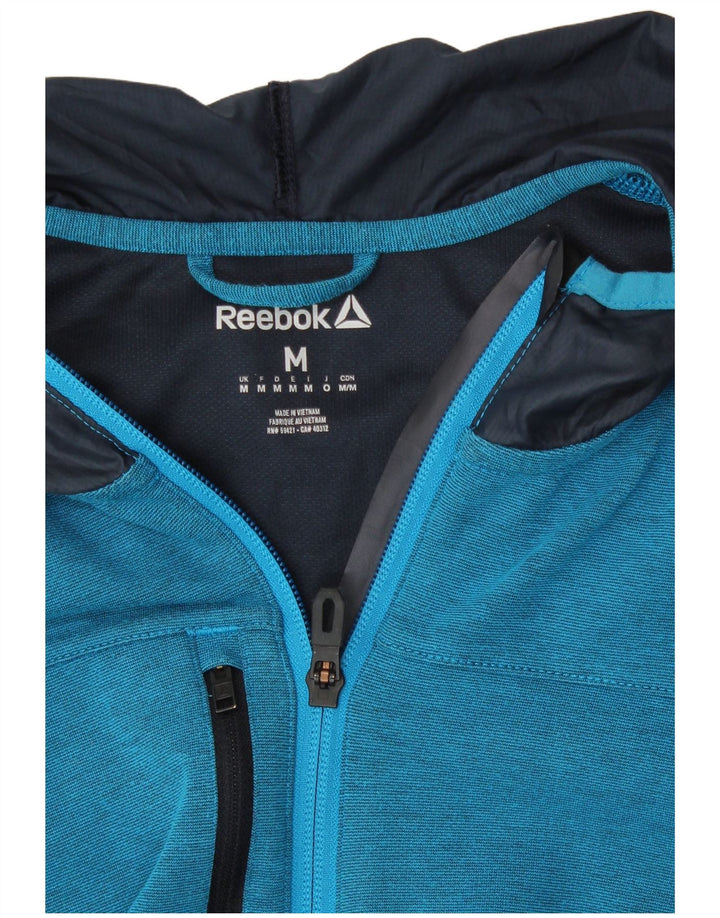 Reebok Herren Kapuzenpullover mit 1/4-Reißverschluss, mittelblaues Polyester