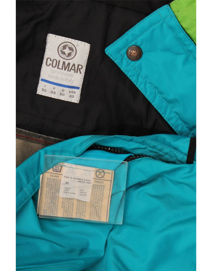 Colmar Herren-Skioverall mit lockerer Passform, IT 50, mittelblaues Colourblock-Polyamid