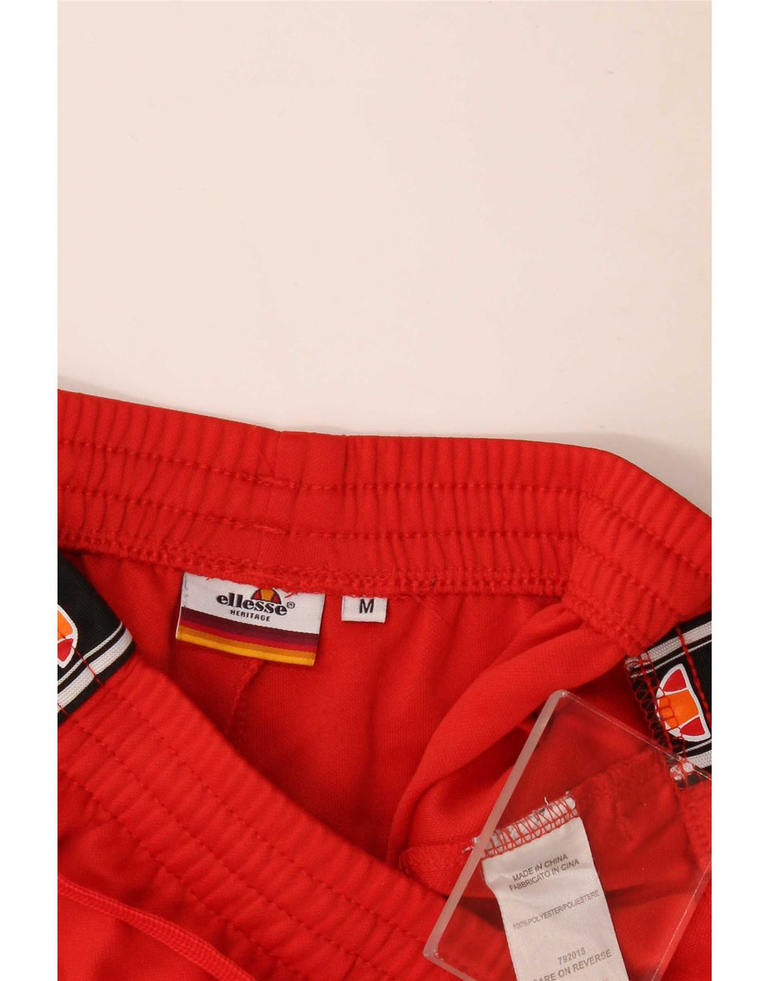 Ellesse Herren-Trainingshose mit Grafik, Mittelrotes Farbblock-Polyester