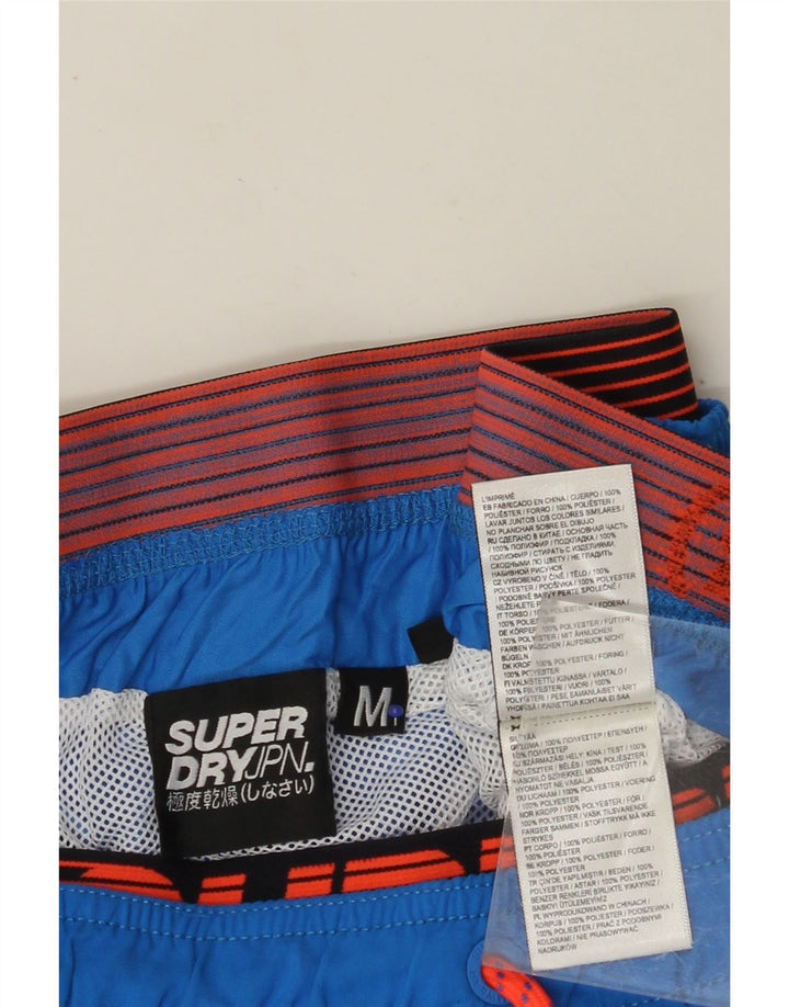 SUPERDRY Herren-Badeshorts mit Grafik, mittelblau, Polyester