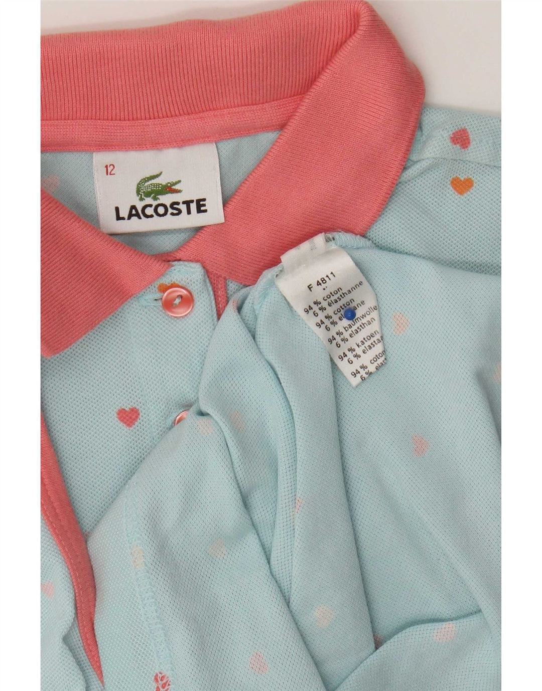 Lacoste Mädchen-Poloshirt mit abstraktem Muster, 11–12 Jahre, blaues Farbblockdesign