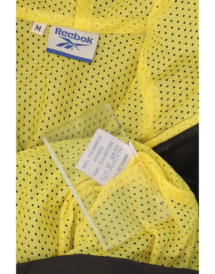 REEBOK Mens Hooded Rain Jacket UK 38 Medium Black Polyamide Vintage Reebok and Second-Hand Reebok from Messina Hembry 
