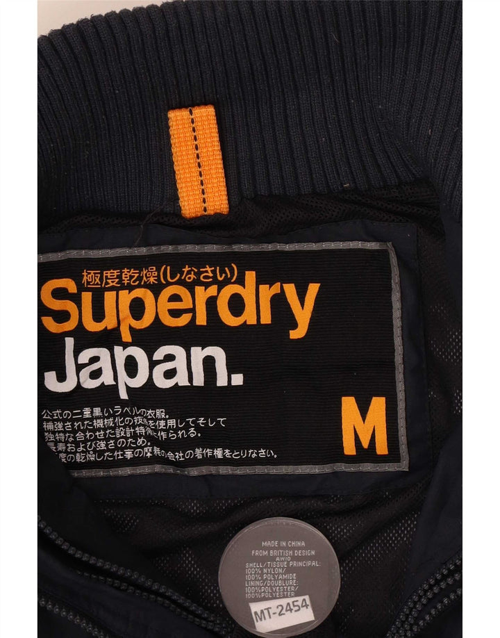 Superdry Damen-Regenjacke mit Grafik, UK 14, mittelmarineblaues Nylon