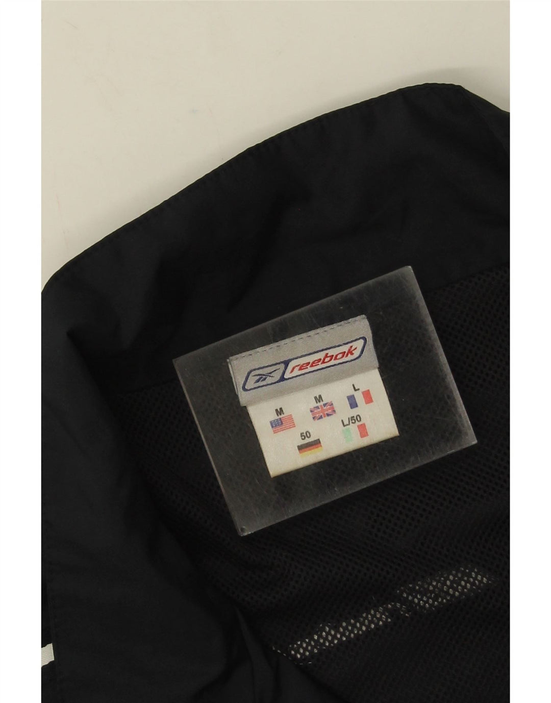 Reebok Herren-Trainingsanzugoberteil mit lockerer Passform, Mittelschwarz, Farbblock